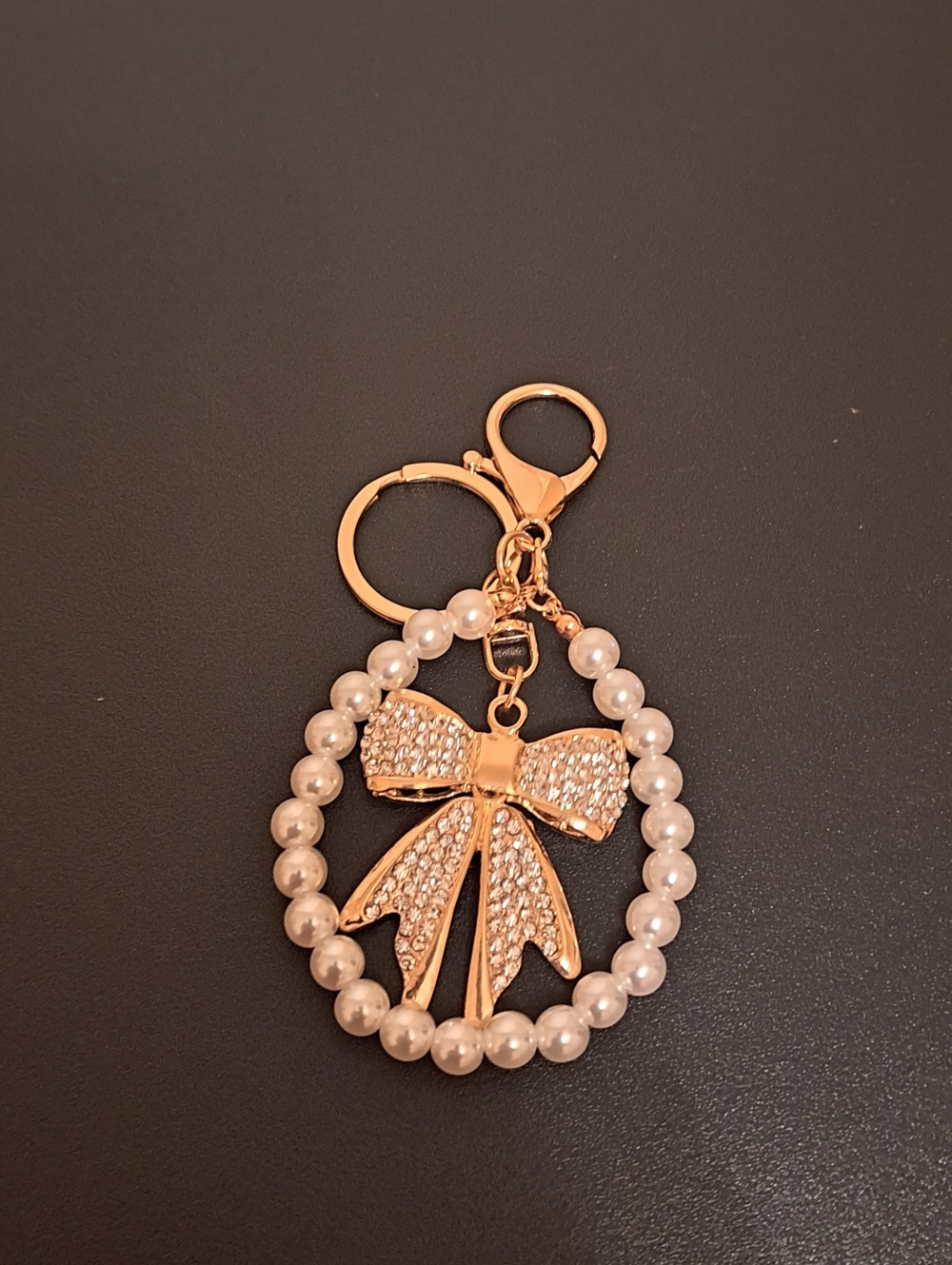 Pearl & Gold Bow Keychain charm new in package.